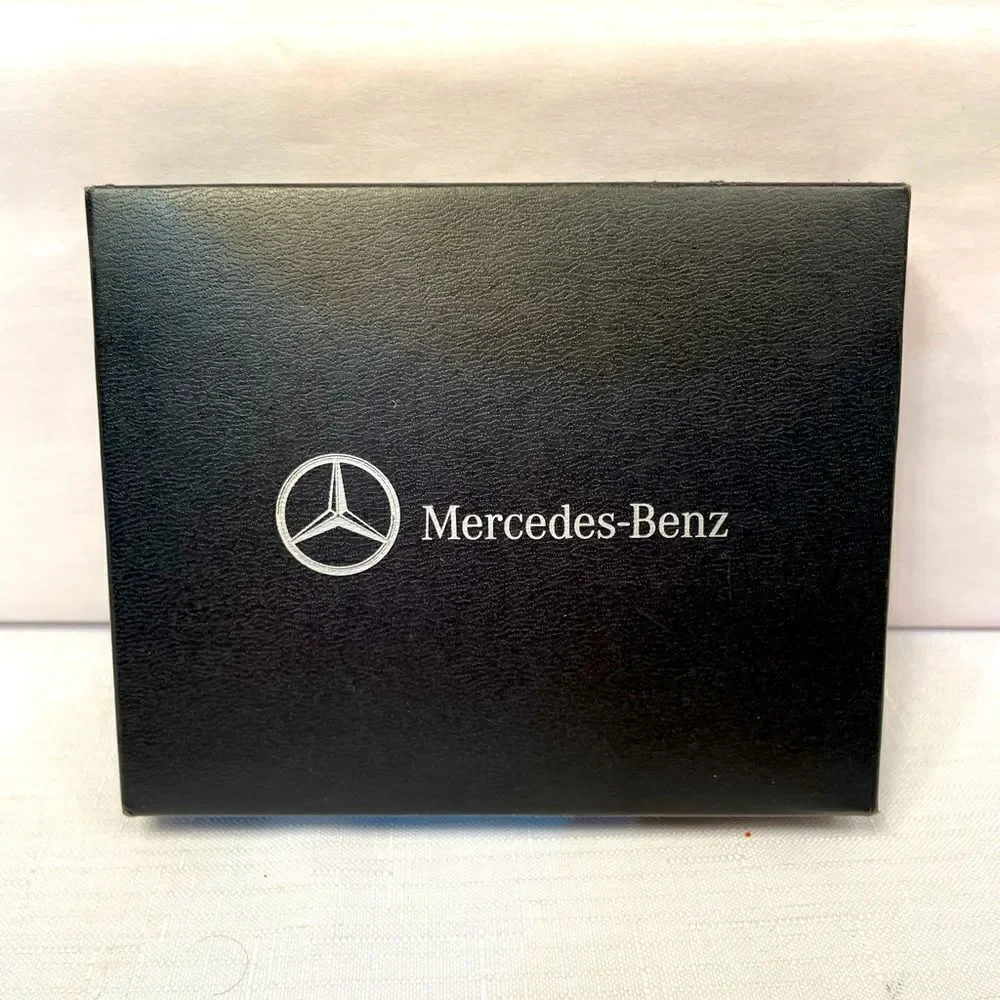 MERCEDES BENZ NIB CORKSCREW AND BOTTLE STOPPER